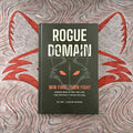 Rogue Domain: Win First, Then Fight signed hardcover by Dr. Logan Rogue on a red fox print background